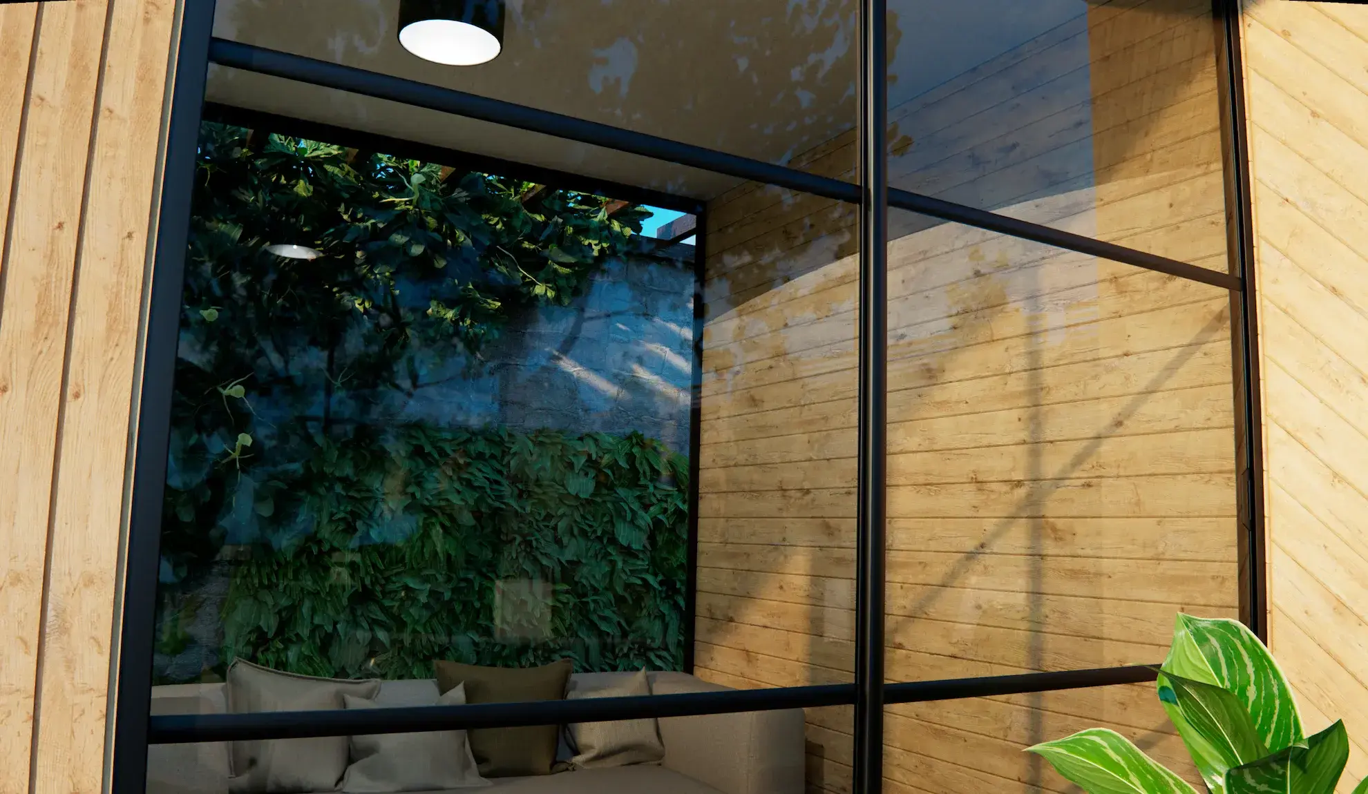 Steellook glazen schuifwand met 2 rails, met houten muren ernaast en een plant erbuiten.
