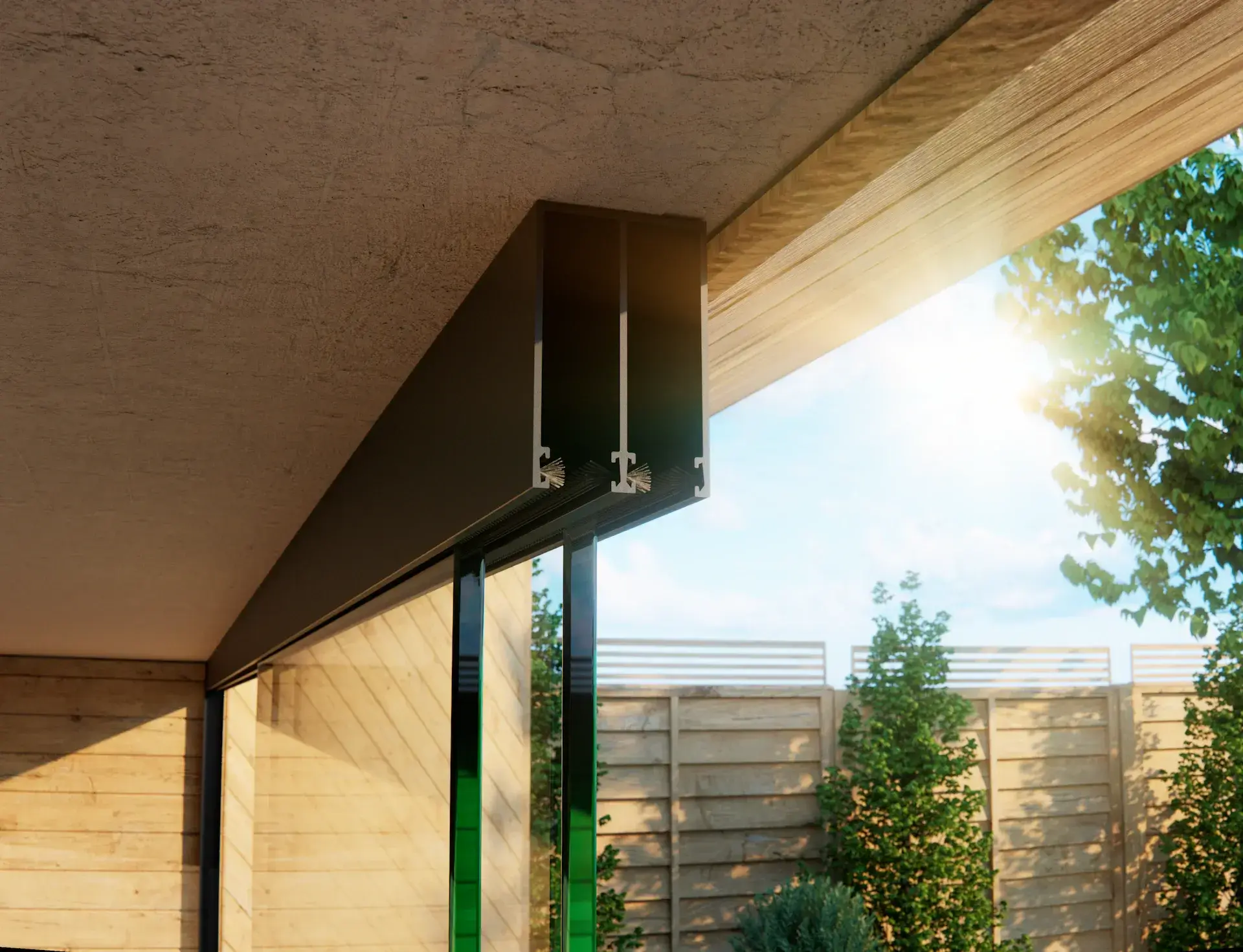 Steellook glazen schuifwand met 2 rails, closeup van de bovenrails met buitenlucht en schutting in de tuin zichtbaar