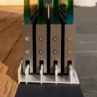 Steellook glazen schuifwand met 4 rails, uiteinde van de schuifwanden goed zichtbaar, recht naast elkaar