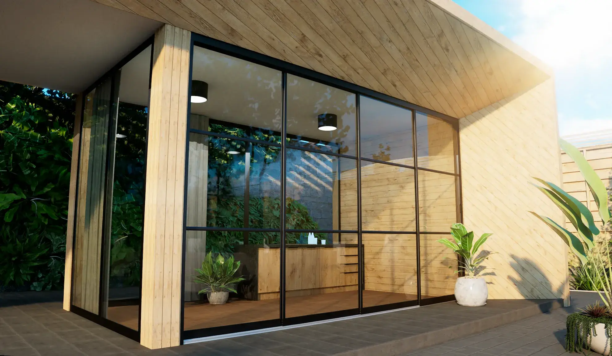 Steellook glazen schuifwand met 4 rails, houten muren en plafond. Met planten ingericht en buitenlucht zichtbaar