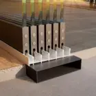 Steellook glazen schuifwand met 6 rails, uiteinde van de wanden allemaal recht naast elkaar, netjes gelegd