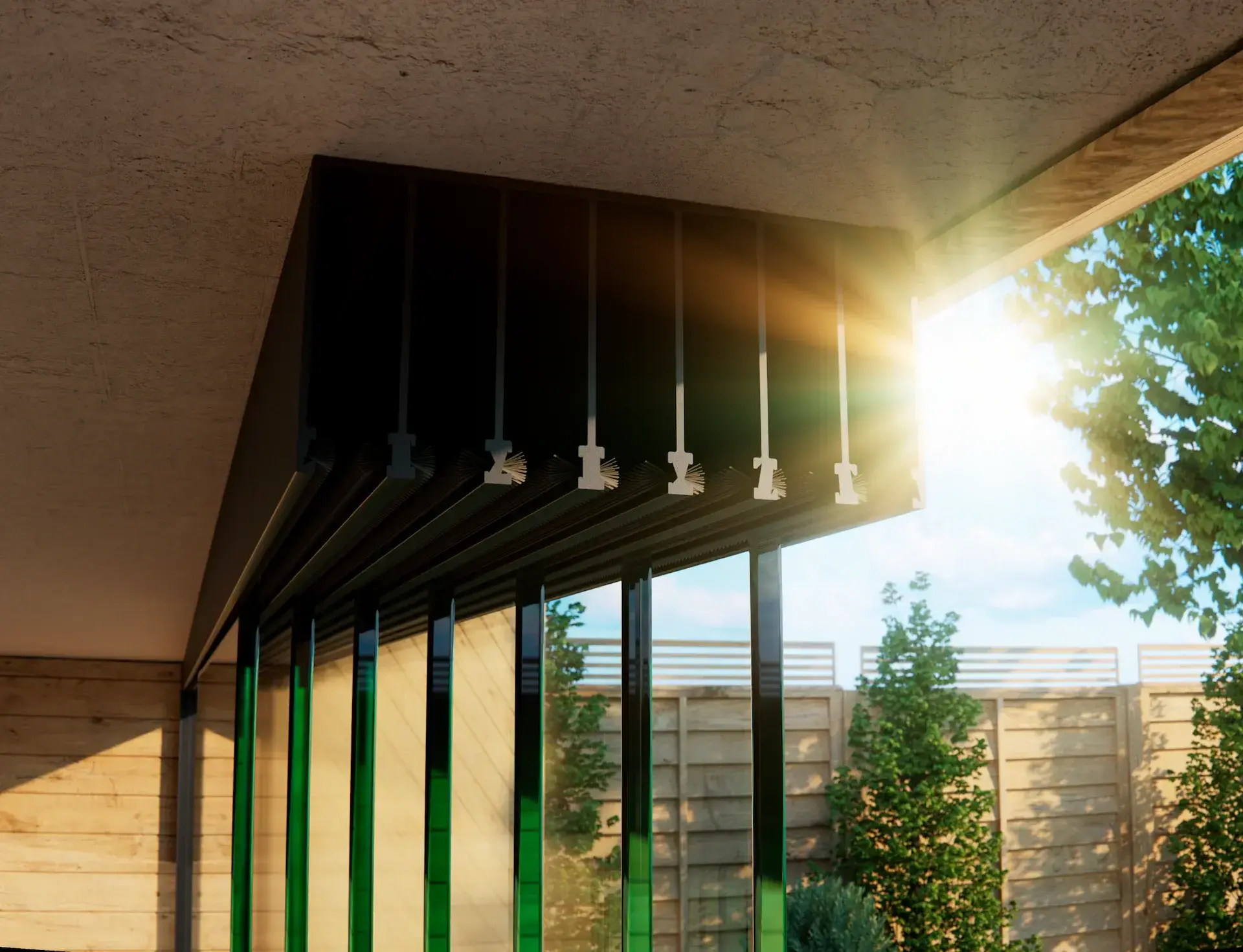 Steellook glazen schuifwand met 7 rails, bovenrails met zon in zicht en veel planten en bomen