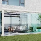 Witte serre met glazen schuifwanden 4 rails